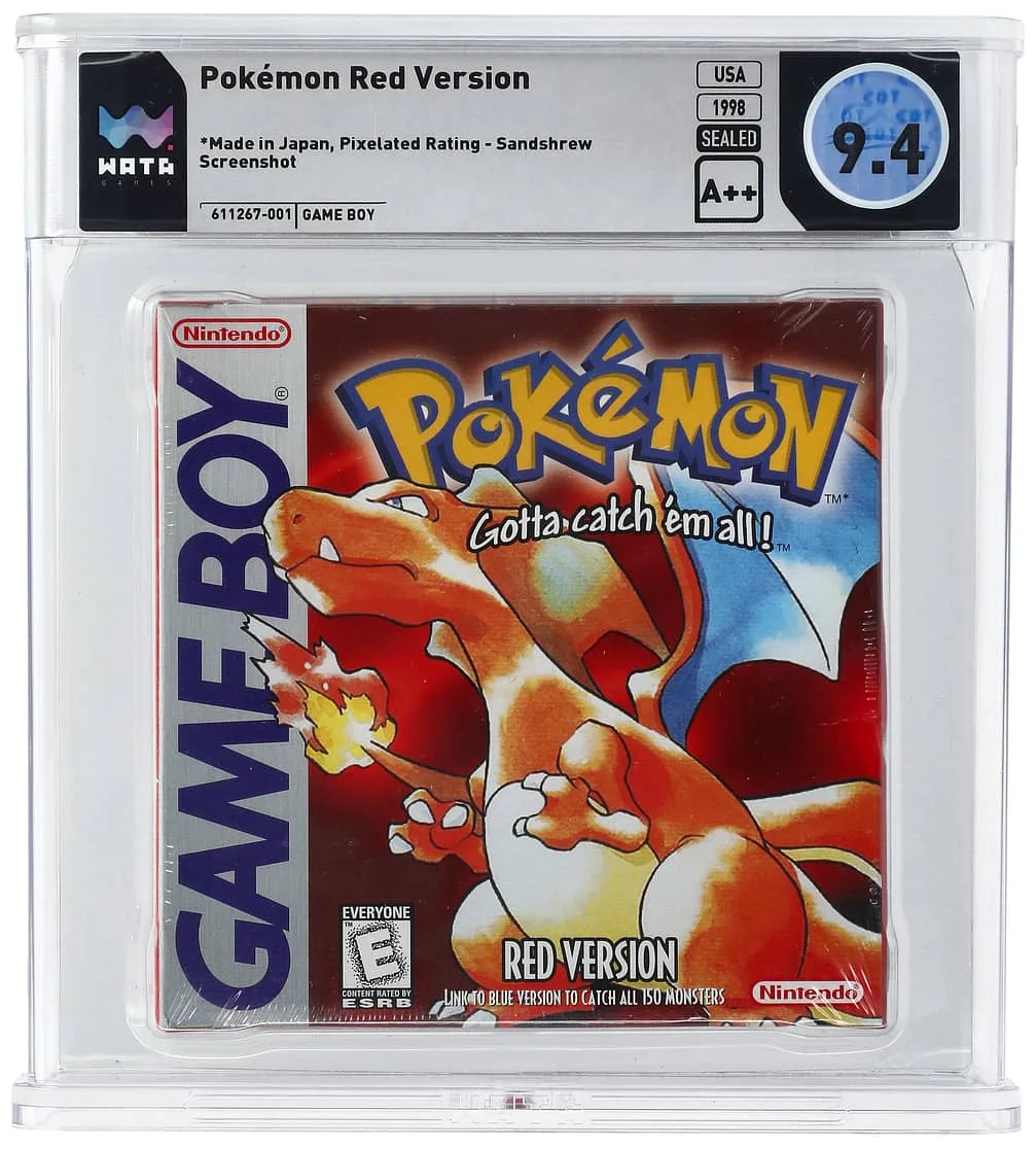 Cover of "Pokémon Red Version" for Game Boy, featuring artwork of a dragon-like character. The game is graded 9.4 by Wata Games, indicating high quality, and is sealed. Labels show it's made in Japan and released in the USA in 1998.