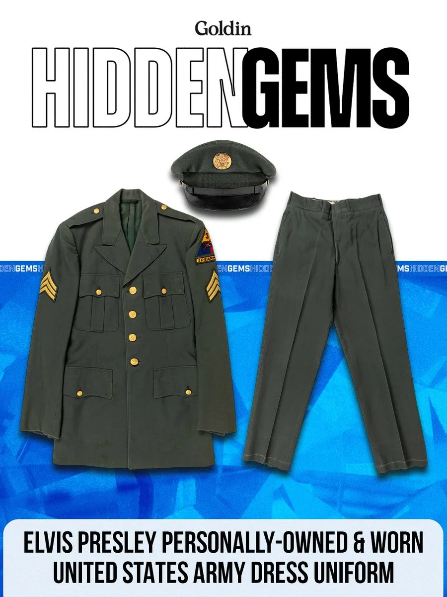 A United States Army dress uniform, including a jacket, pants, and a peaked cap, is displayed. The text reads "Goldin Hidden Gems" and states that the uniform was personally owned and worn by Elvis Presley.