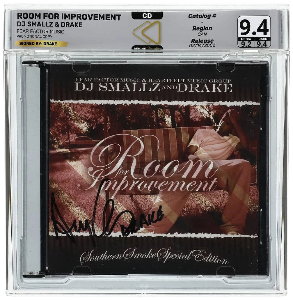 CD cover titled "Room for Improvement" by DJ Smallz and Drake. It features an ornate script on a dark background with floral details. The cover has a signature and is encased in a graded collector's sleeve with ratings.