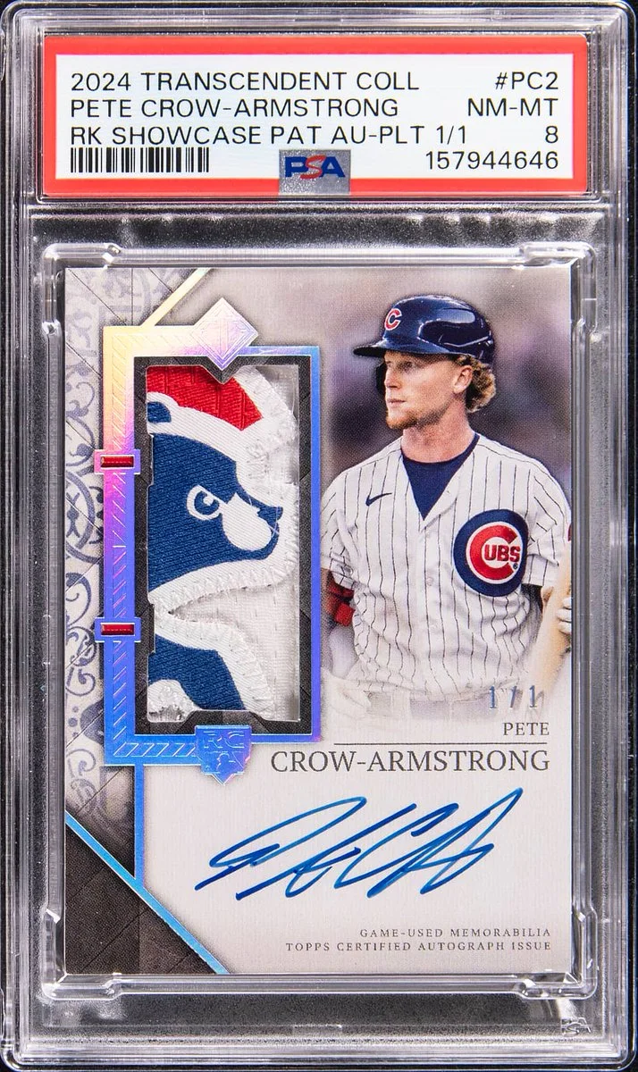 Baseball card featuring Pete Crow-Armstrong from the 2024 Transcendent Collection. It includes a Cubs logo and a signature. The card is numbered 1/1 and graded NM-MT 8 by PSA.