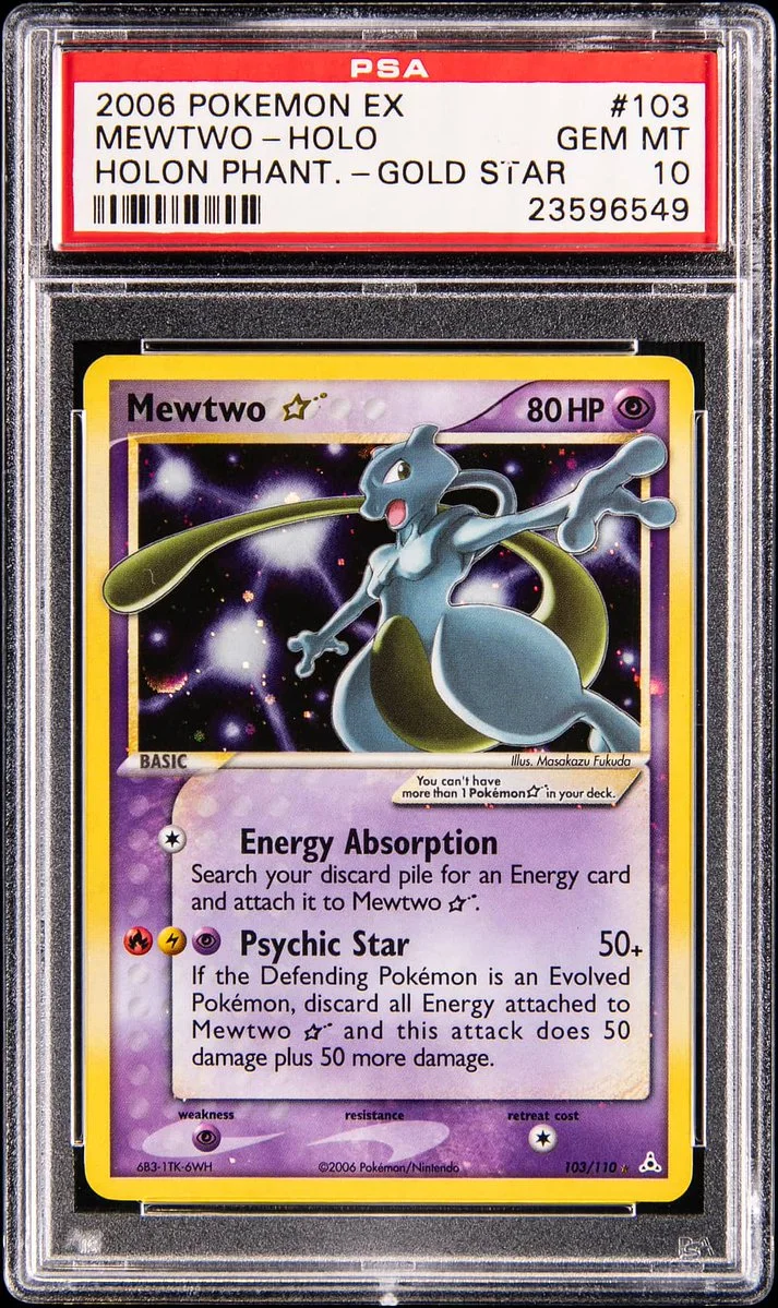 A graded Pokemon card inside a protective case. The card features "Mewtwo," labeled "2006 Pokemon EX," and titled "Holon Phantoms - Gold Star." The card is graded as "GEM MINT 10" by "PSA." It has detailed stats and artwork of the character.
