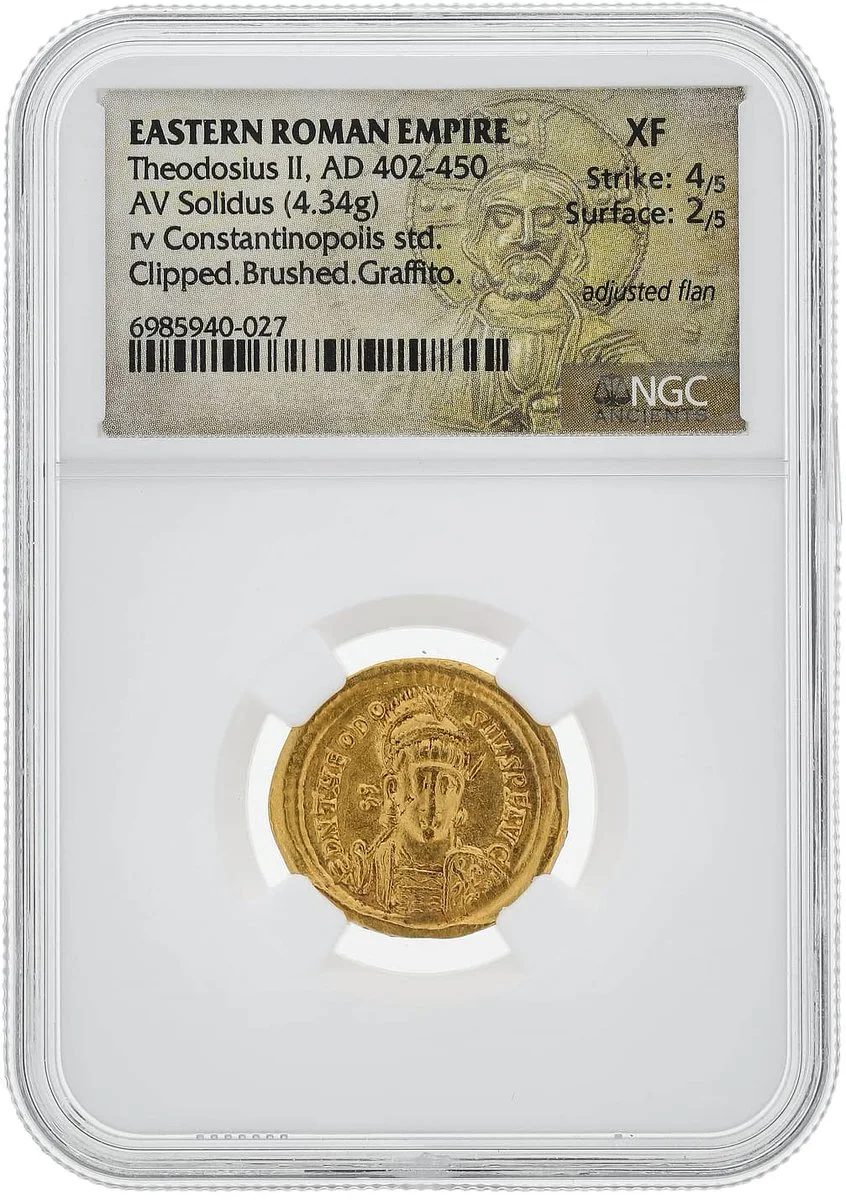 Gold coin from the Eastern Roman Empire, featuring Theodosius II (AD 402-450). The coin is labeled with details of condition and grading by NGC.