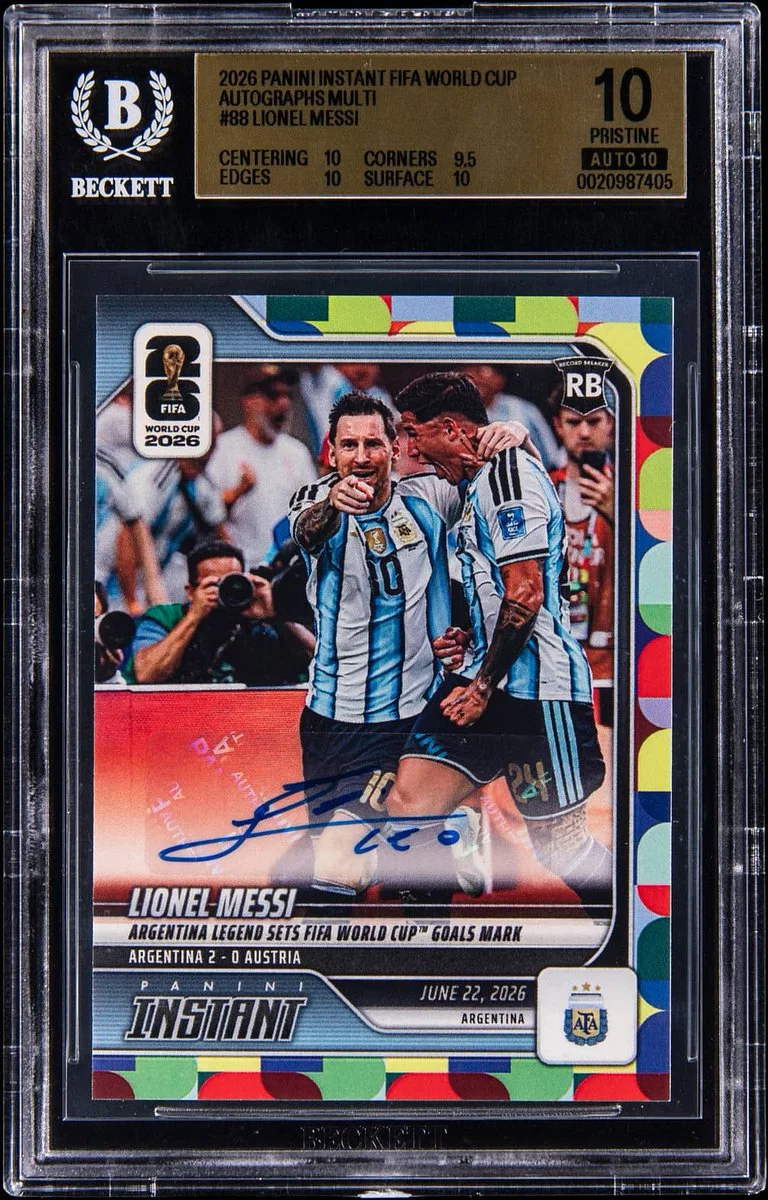 This image shows a graded soccer trading card featuring Argentina's Lionel Messi. The card is marked "Panini Instant FIFA World Cup" and is rated 10 Pristine by Beckett. The card highlights Messi celebrating a goal, with the text indicating it's from a World Cup match on June 22, 2026, between Argentina and Austria.