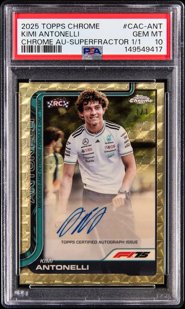 This image shows a 2025 Topps Chrome trading card featuring Kimi Antonelli. The card includes an autograph and is labeled as a "Superfractor 1/1," noted for its rarity. It has a PSA grading of 10 GEM MT. The card's design features a dynamic background with racing-related details.