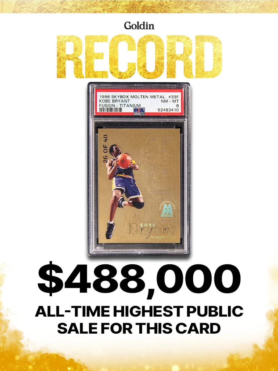 A basketball trading card featuring Kobe Bryant is showcased in a protective case. The card is labeled "1998 Skybox Molten Metal Fusion - Titanium" and is numbered 36 of 40. Text above reads "Goldin Record," and below indicates the card's sale price of $488,000, described as the "all-time highest public sale for this card.
