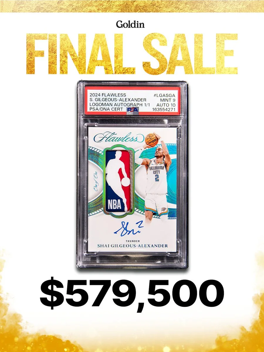 This image features a basketball trading card encased in plastic with the label "2024 Flawless S. Gilgeous-Alexander Autograph." The card includes an NBA logo and an autograph. Text at the top reads "Goldin Final Sale," and the bottom displays the price "$579,500.