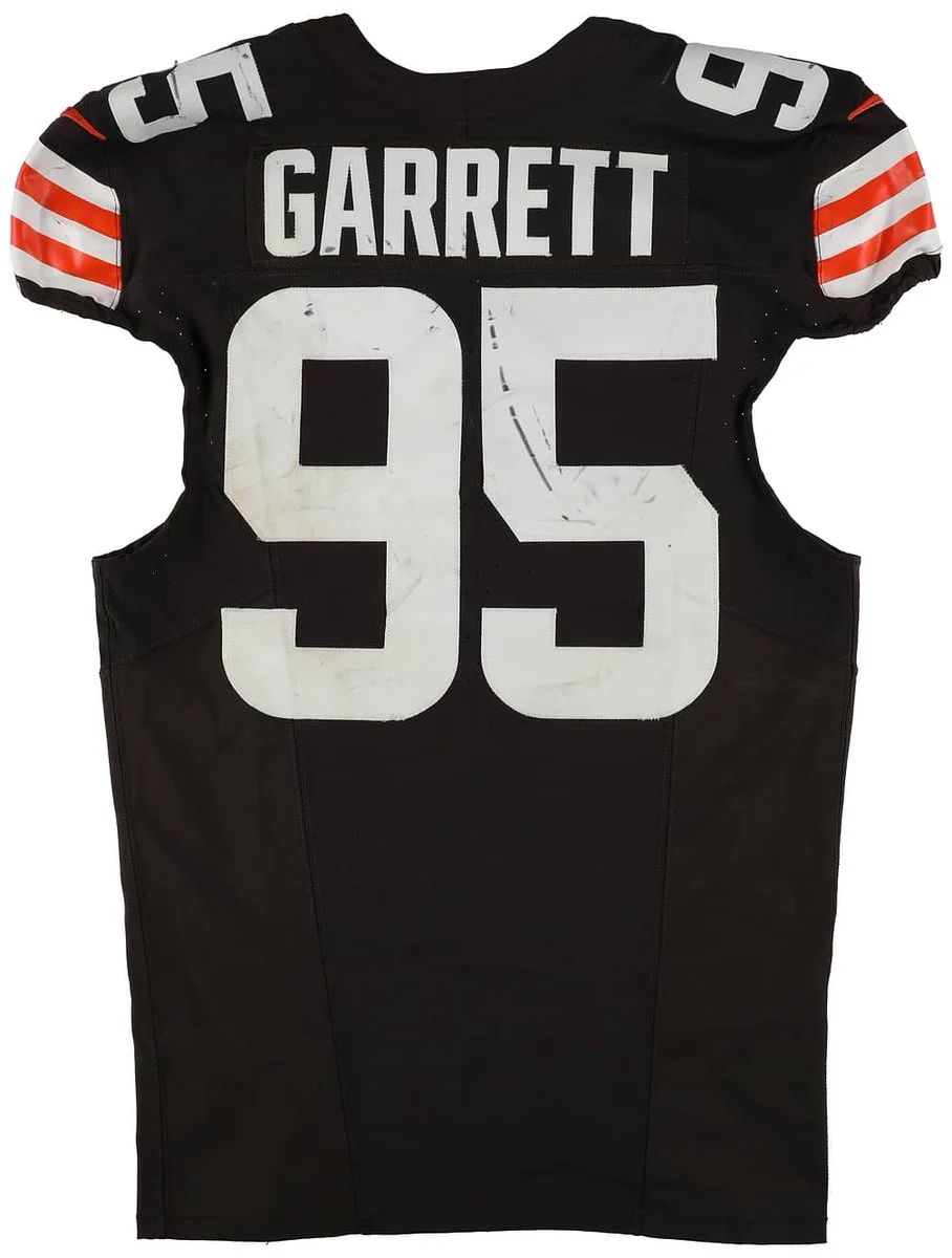 A Cleveland Browns football jersey with the name "Garrett" and number 95 on the back.