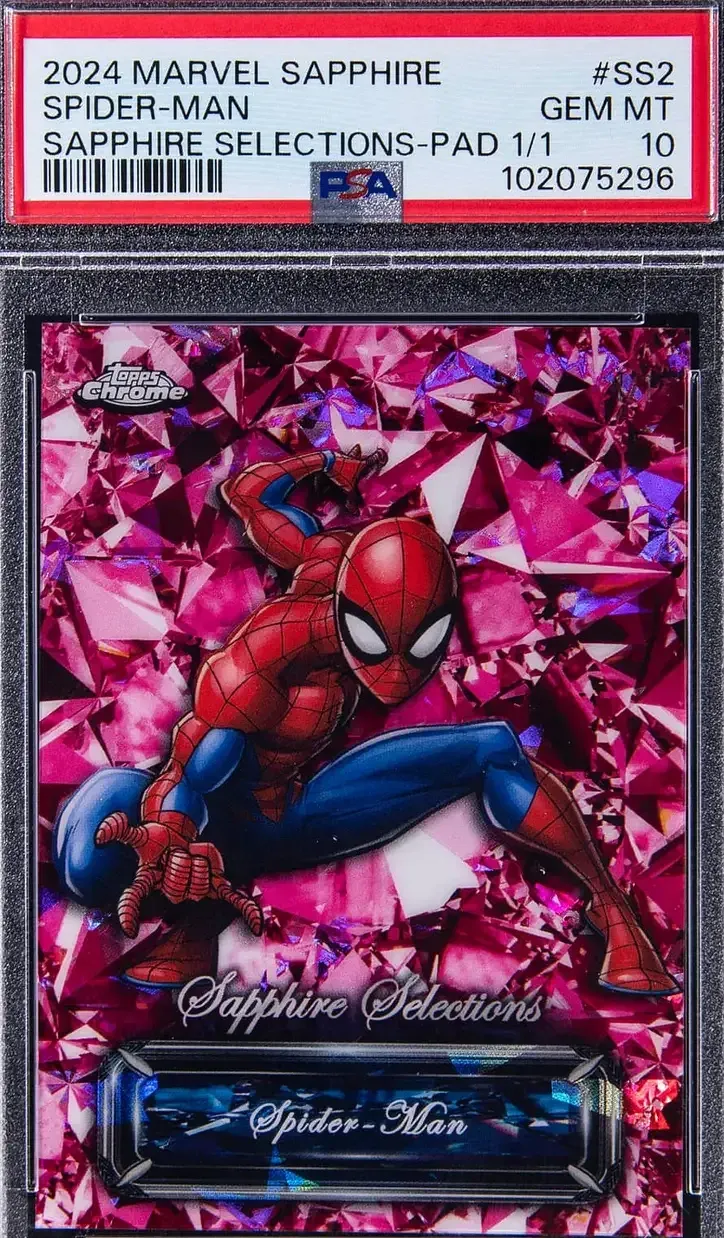 Image of 2024 Topps Chrome Marvel Sapphire Padparadshca which shows Spider-Man in red and blue suit over pink gem background.