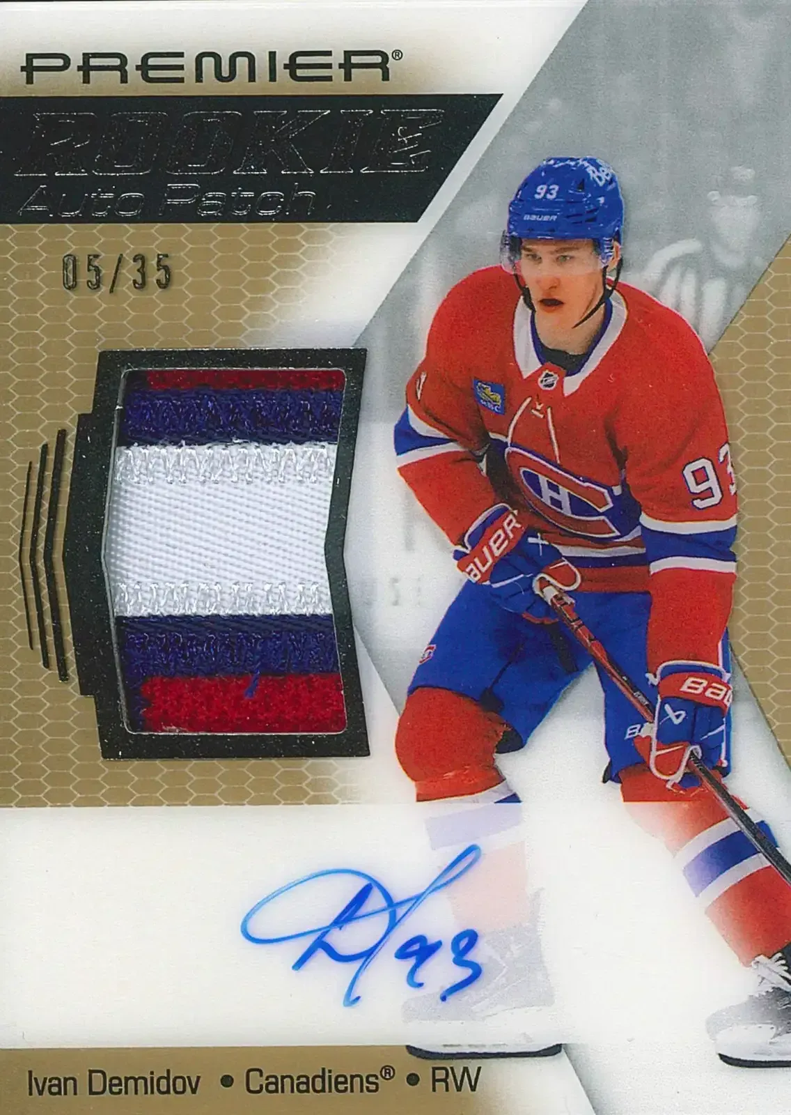 Player in red, white, and blue uniform, on the right, with patch on the left, and autograph below.