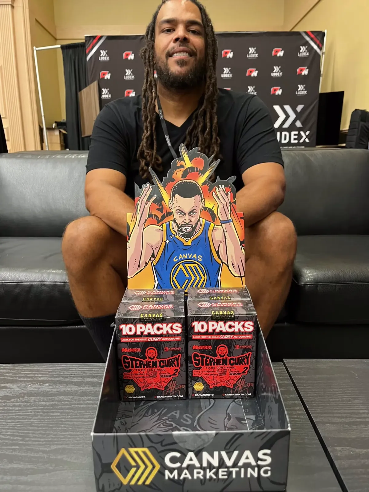 Canvas Marketing's Will Wade and Steph Curry cards.