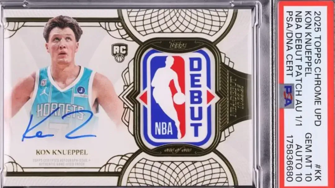 Image of player in Charlotte Hornets jersey with blue autograph under picture with nba debut patch on right side of card