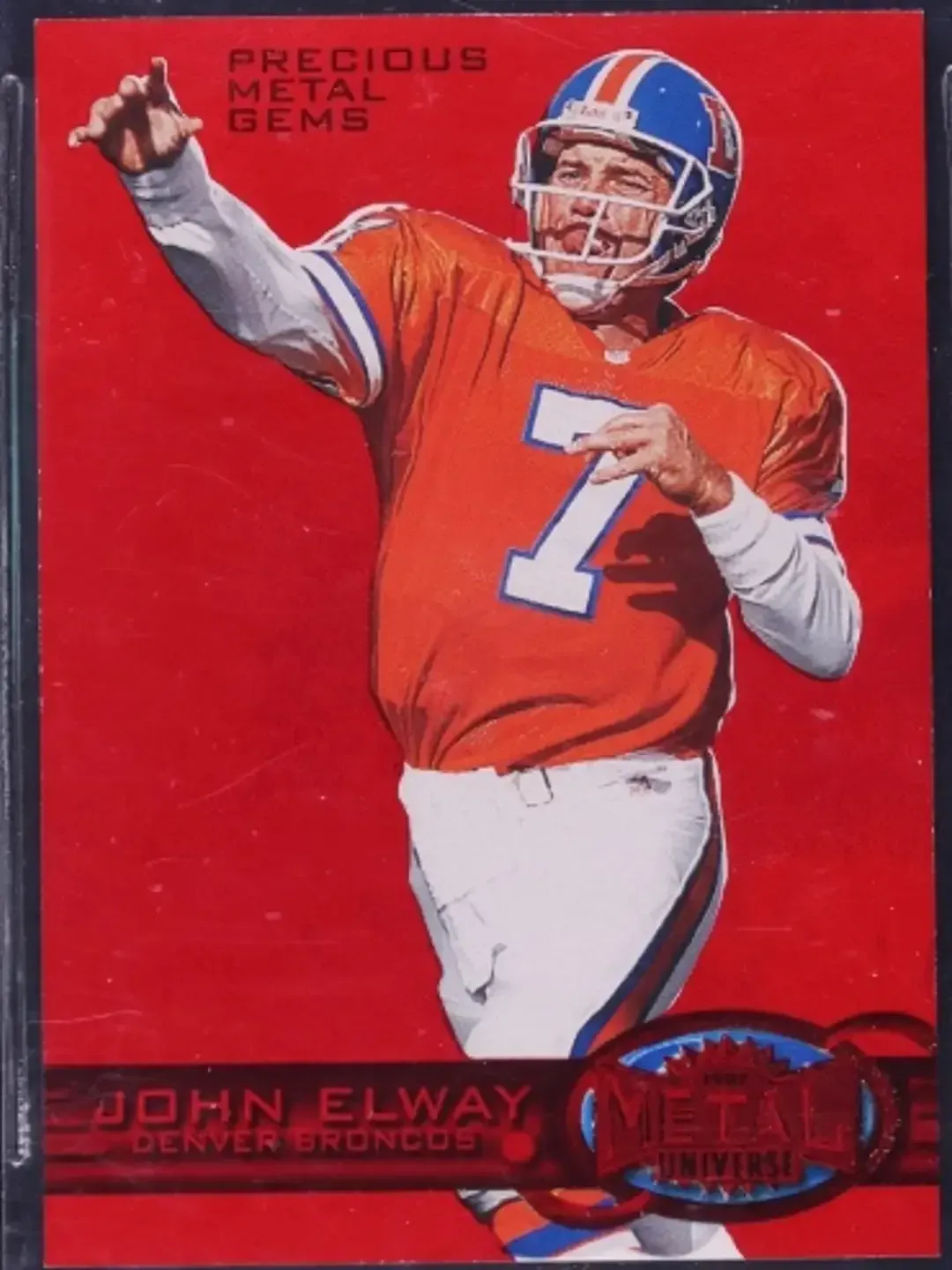 QB throwing ball with right hand with iconic blue helmet and orange jersey.