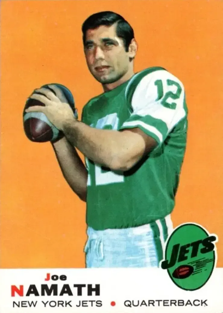 Image of player on Orange Background, first letter of first and last name in red, with rest in black.