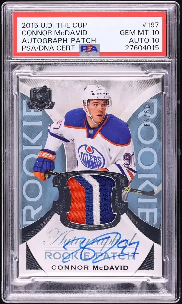 PSA 10 Connor McDavid 2015-16 The Cup rookie patch autograph card with a jersey patch and blue ink signature