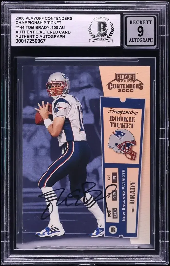 Image of player with silver New England Patriots helmet with white jersey and blue pants, with black autograph below.
