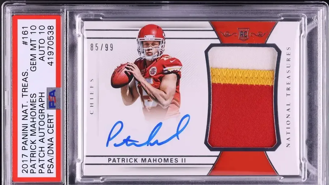 Blue autograph below player photo with patch of jersey on right of card, in a PSA slab and graded a 10 overall.
