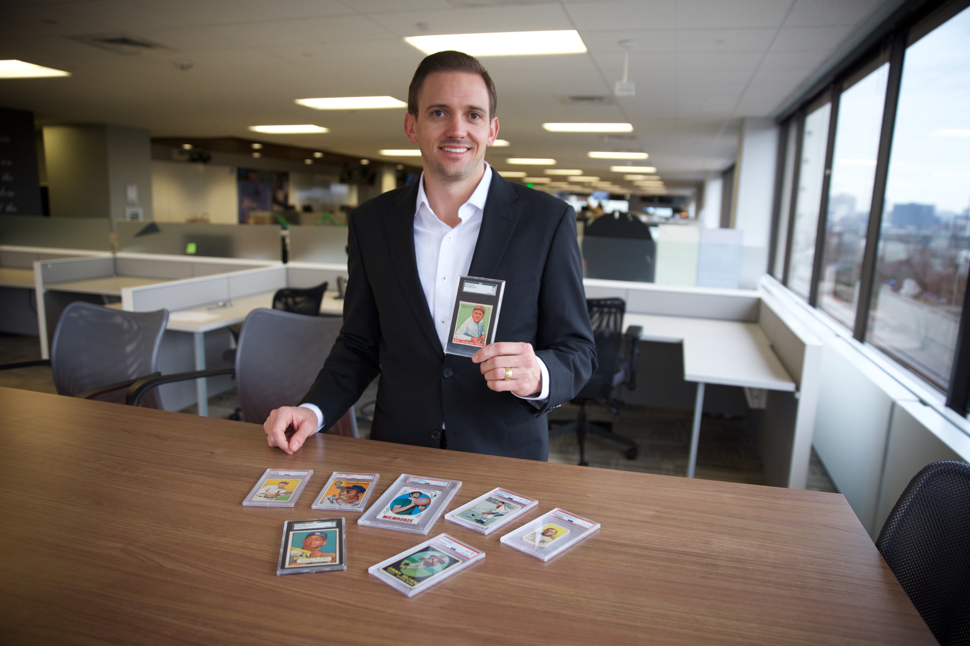 Fanatics Shakes Up the Trading Card Marketplace: CEO Brent Huigens Departure from PWCC